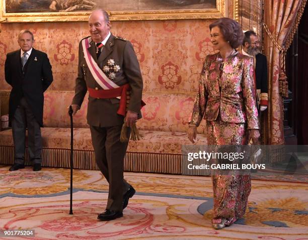 Former King of Spain Juan Carlos I and his wife former Queen Sofia attend the Epiphany Day celebrations at the Royal Palace in Madrid, January 6,...