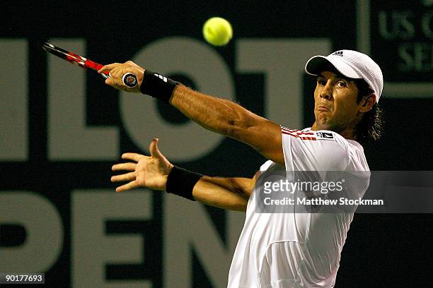 Fernando Verdasco of Spain returns a shot to Sam Querrey during the final of the Pilot Pen Tennis tournament at the Connecticut Tennis Center at Yale...