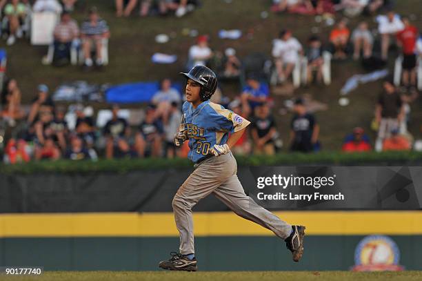 Second baseman Bulla Graft of the West rounds the bases after hitting a home run against the Southwest in the US final at Lamade Stadium on August...