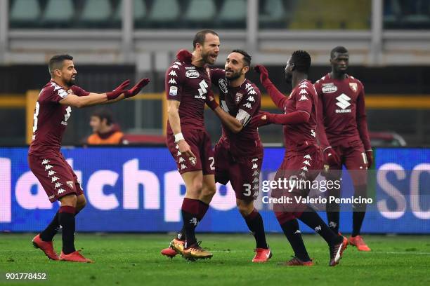 Lorenzo De Silvestri of Torino FC celebrates after scoring the opening goal with team mates during the serie A match between Torino FC and Bologna FC...