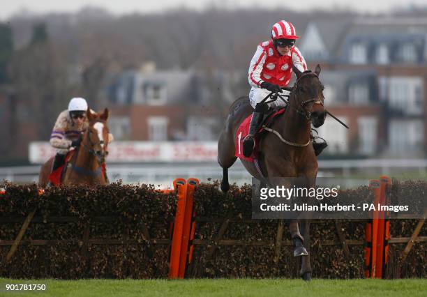 Crucial Moment and Sean Houlihan clear the last flight before going on to win The 32Red Casino Juvenile Hurdle Race run during 32Red Day at Sandown...
