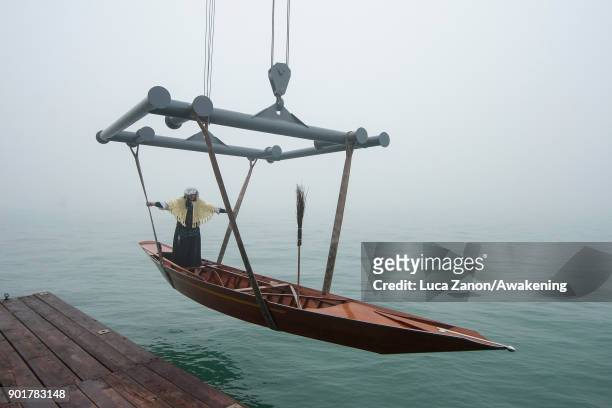 Rover stands on his boat while is launhed in the lagoon ahead of the 40th Befana Regata on January 6, 2018 in Venice, Italy. In Italian folklore,...