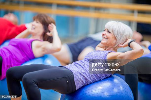 exercise balls - gym excercise ball stock pictures, royalty-free photos & images