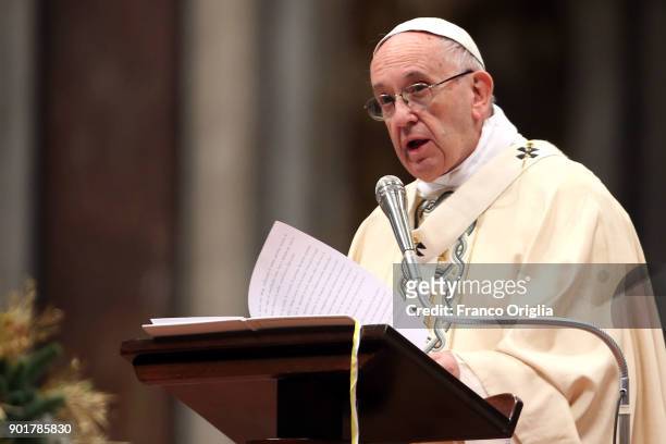 Pope Francis delivers his homily as he attends a solemn mass to commemorate the Feast of the Epiphany at the St. Peter's Basilicaon January 6, 2018...