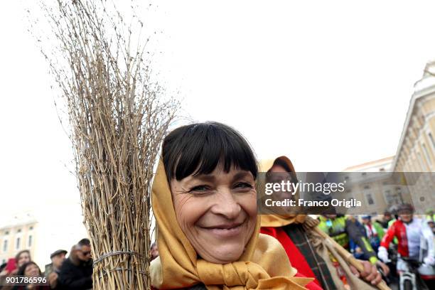 Befanas gather in St Peter's Square during the Feast of the Epiphany to attend the Pope Francis' Angelus blessing on January 6, 2018 in Vatican City,...