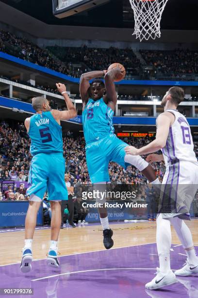 Johnny O'Bryant III of the Charlotte Hornets rebounds against the Sacramento Kings on January 2, 2018 at Golden 1 Center in Sacramento, California....
