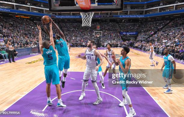 Johnny O'Bryant III of the Charlotte Hornets rebounds against the Sacramento Kings on January 2, 2018 at Golden 1 Center in Sacramento, California....