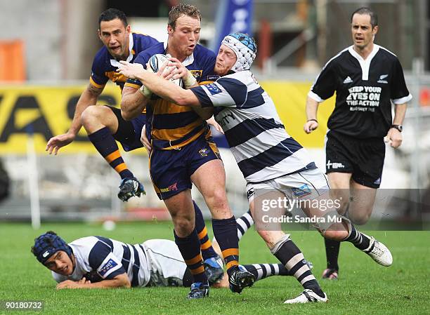 Luke Braid of Bay of Plenty is tackeld by Hamish Paterson of Auckland during the Air New Zealand Cup match between Auckland and Bay of Plenty at Eden...