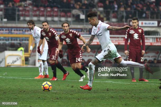 Bologna midfielder Erick Pulgar shoots the ball by penalty kick during the Serie A football match n.20 TORINO - BOLOGNA on at the Stadio Olimpico...