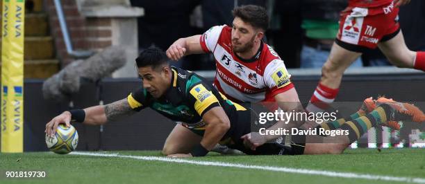 Ken Pisi of Northampton dives over for the first try during the Aviva Premiership match between Northampton Saints and Gloucester Rugby at Franklin's...