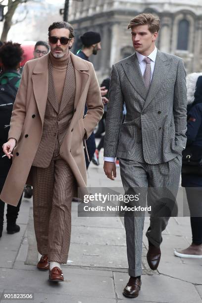 Richard Biedul and Toby Huntington-Whiteley attend the What We Wear Show at BFC Show Space during London Fashion Week Men's January 2018 on January...