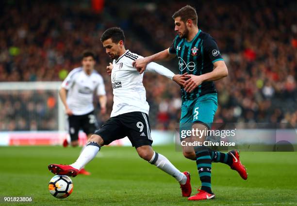 Rui Fonte of Fulham and Jack Stephens of Southampton during the The Emirates FA Cup Third Round match between Fulham and Southampton at Craven...