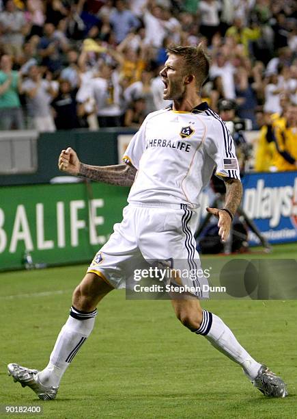 David Beckham of the Los Angeles Galaxy celebrates after scoring a goal against Chivas USA on August 29, 2009 at the Home Depot Center in Carson,...