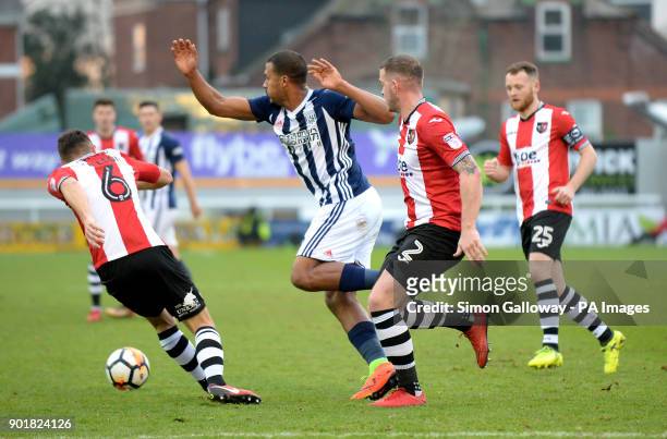 West Bromwich Albion's Salomon Rondon and Exeter City's Pierce Sweeney battle for the ball during the FA Cup, third round match at St James' Park,...