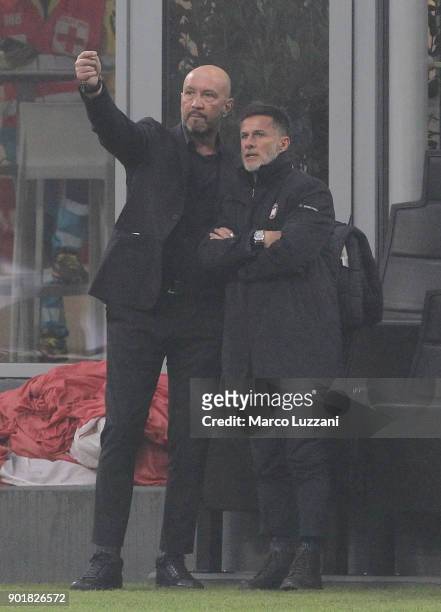 Crotone coach Walter Zenga and Benito Carbone during the serie A match between AC Milan and FC Crotone at Stadio Giuseppe Meazza on January 6, 2018...