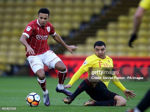 Bristol City's Korey Smith and Watford's Troy Deeney in action during the FA Cup, third round match at Vicarage Road, Watford.