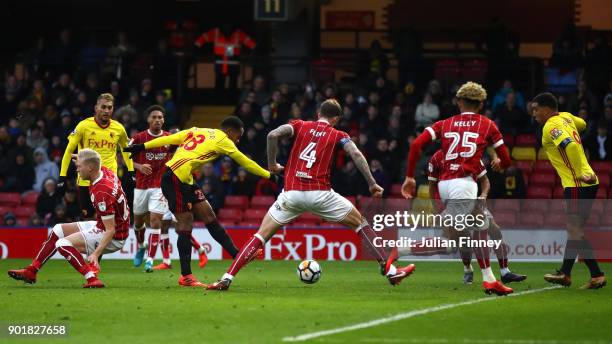 Andre Carrilo of Watford scores his sides first goal during The Emirates FA Cup Third Round match between Watford and Bristol City at Vicarage Road...