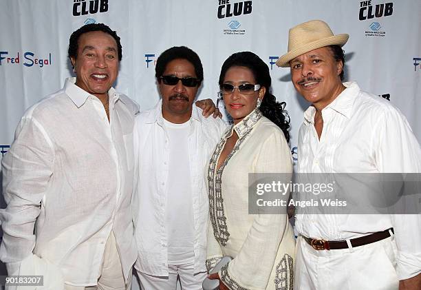 Smokey Robinson, Mark Davis, Frances Robinson and Leon Kennedy arrive at Fred Segal's birthday celebration benefitting the Boys & Girls Club of...