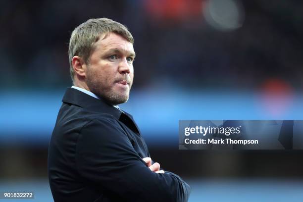 Grant McCann, Manager of Peterborough United look on during the The Emirates FA Cup Third Round match between Aston Villa and Peterborough United at...