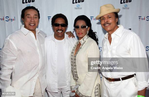 Smokey Robinson, Mark Davis, Frances Robinson and Leon Kennedy arrive at Fred Segal's birthday celebration benefitting the Boys & Girls Club of...