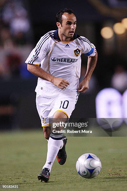 Landon Donovan of the Los Angeles Galaxy attacks the defense of Chivas USA during their MLS game at The Home Depot Center on August 29, 2009 in...