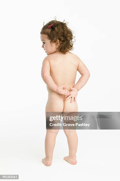 backside of 2 year old  toddler girl - girl bums stock-fotos und bilder