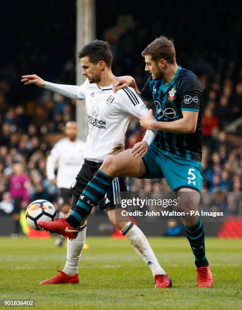 Fulham's Rui Fonte battle for possession of the ball with Southampton's Jack Stephens during the FA Cup, third round match at Craven Cottage, London.