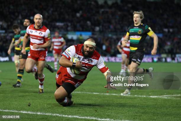 John Afoa of Gloucester dives to score his second try during the Aviva Premiership match between Northampton Saints and Gloucester Rugby at...
