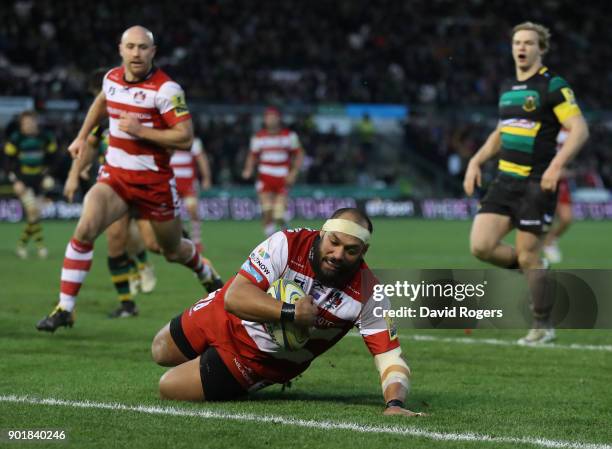 John Afoa of Gloucester dives to score his second try during the Aviva Premiership match between Northampton Saints and Gloucester Rugby at...