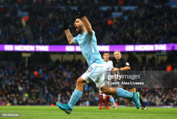 Sergio Aguero of Manchester City celebrates scoring his first goal during The Emirates FA Cup Third Round match between Manchester City and Burnley...