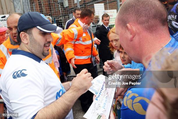 New Portsmouth owner Sulaiman Al Fahim signs autographs as he arrives at Fratton Park before the Barclays Premier League match between Portsmouth and...