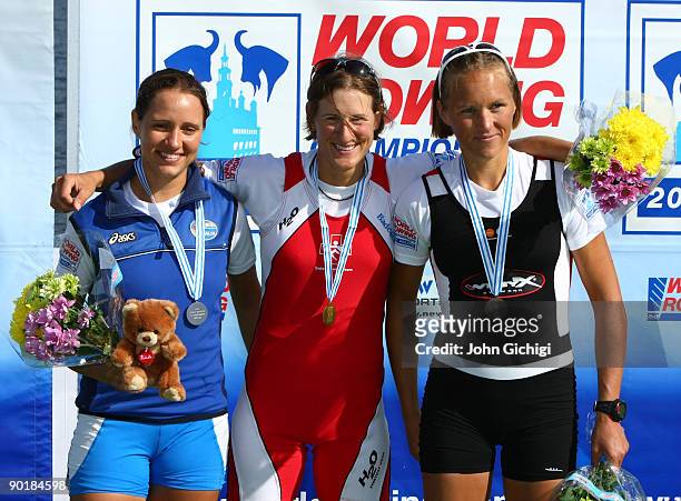 Laura Milani of Italy Pamela Weisshaupt of Switzerland and Juliane Rasmussen of Denmark pose after the Women's Lightweight Single Sculls during the...