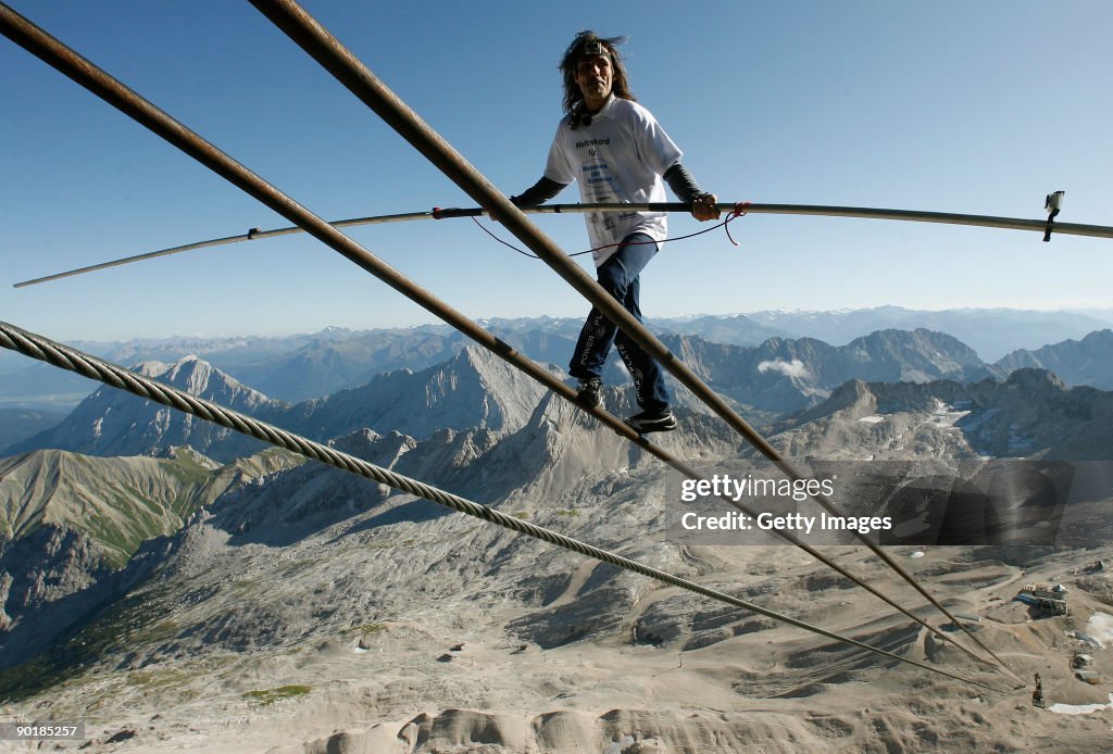 Tightrope Artist Freddy Nock Performs At Zugspitze Mountain