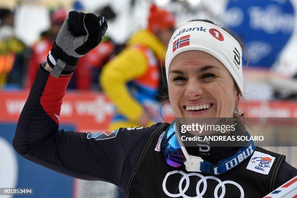 First place winner Heidi Weng of Norway celebrates in the finish area after the Women's Cross Country 10km Mass Start Classic race of the FIS World...