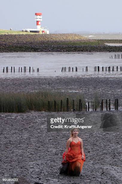 Participant of the fashion show poses during the Mudflat Olympic Games on August 30, 2009 in Brunsbuttel, Germany.