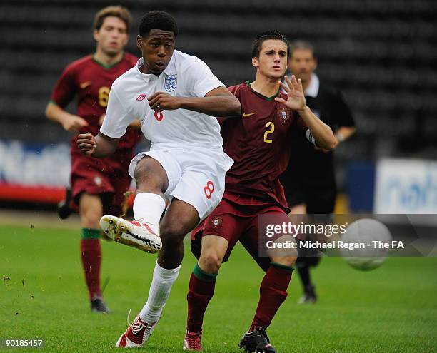 Chuks Aneke of England scores the first goal during the international match between England U17 and Portugal U17 at Meadow Lane on August 30, 2009 in...