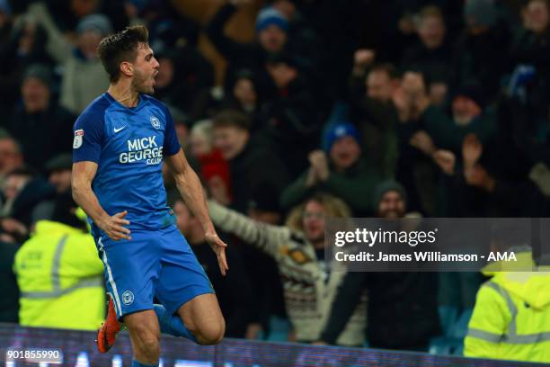 Ryan Tafazolli of Peterborough United celebrates after scoring a goal to make it 2-1 during The Emirates FA Cup Third Round fixture between Aston...