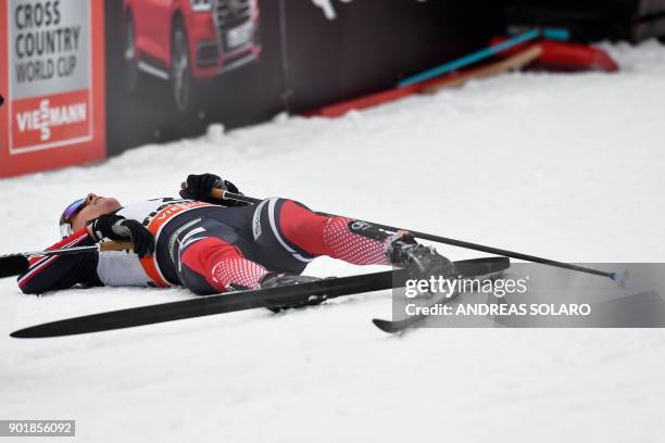 Norway's winner Heidi Weng reacts in the finish area, after crossing the finish line during the Women's Cross Country 10 km Mass Start Classic race...