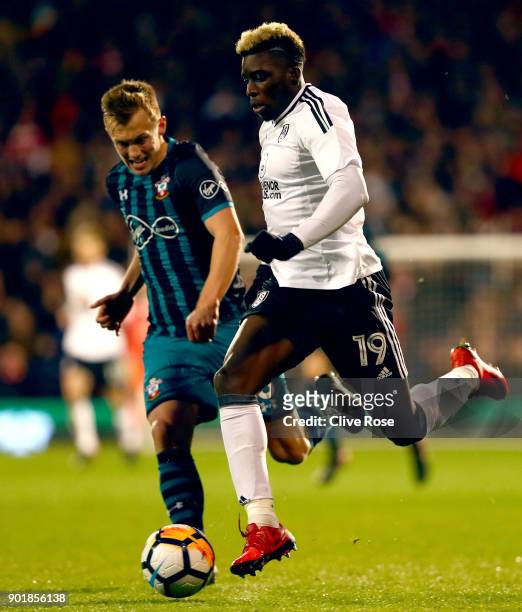 James Ward-Prowse of Southampton and Sheyi Ojo of Fulham during the The Emirates FA Cup Third Round match between Fulham and Southampton at Craven...