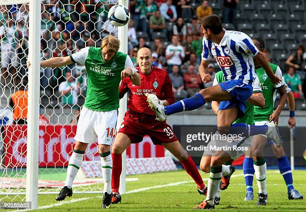 Nemanja Pejcinovic of Berlin heads at goal during the Bundesliga match between Hertha BSC Berlin and SV Werder Bremen at the Olympic stadium on...