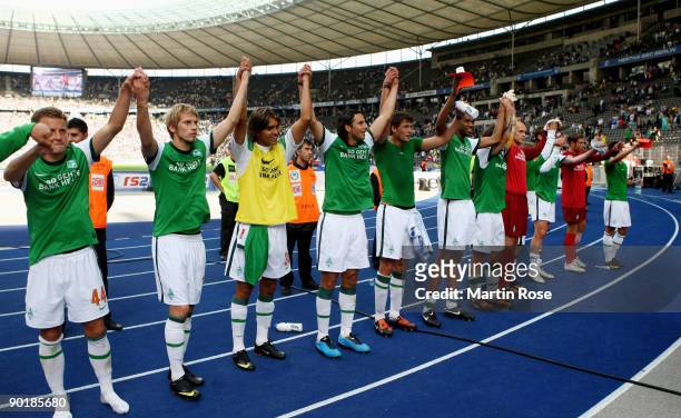The team of Bremen celebrates after the Bundesliga match between Hertha BSC Berlin and SV Werder Bremen at the Olympic stadium on August 30, 2009 in...