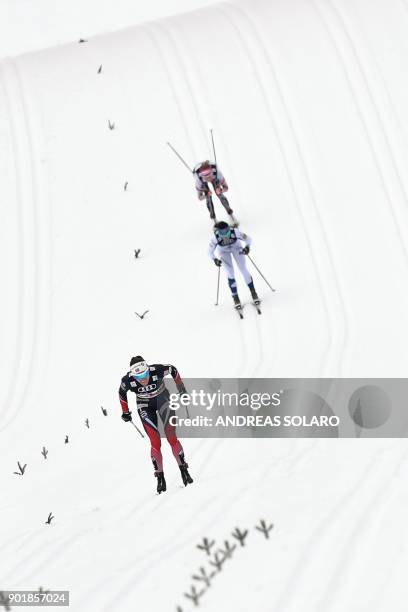 Norway's Heidi Weng competes in the Women's Cross Country 10 km Mass Start Classic race of the FIS World cup Tour de Ski at Val Di Fiemme Cross...