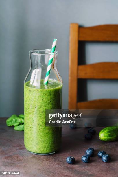 detox green smoothie bottle - cucumber cocktail stock pictures, royalty-free photos & images
