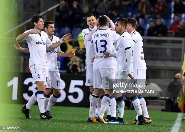 Atalanta's Danish forward Andreas Cornelius celebrates after scoring a goal during the Serie A football match between Roma and Atalanta at Olimpic...