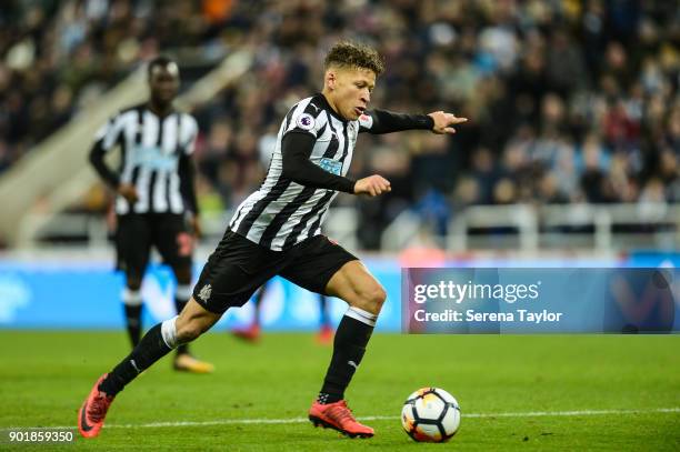 Dwight Gale of Newcastle United strikes the ball during the Emirates FA Cup Third Round between Newcastle United and Luton Town at St.James' Park on...