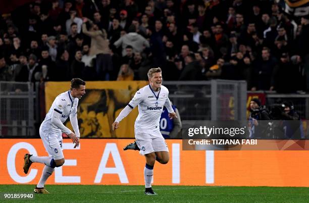 Atalanta's Danish forward Andreas Cornelius celebrates after scoring a goal during the Serie A football match between Roma and Atalanta at Olimpic...