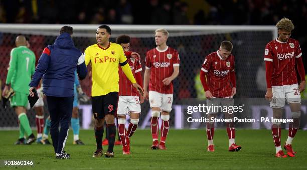 Watford's Troy Deeney shakes hands with Bristol City manager Lee Johnson at full time during the FA Cup, third round match at Vicarage Road, Watford.