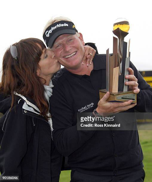 Peter Hedblom of Sweden and his wife Anna with the winners trophy after the final round of the Johnnie Walker Championship on the PGA Centenary...
