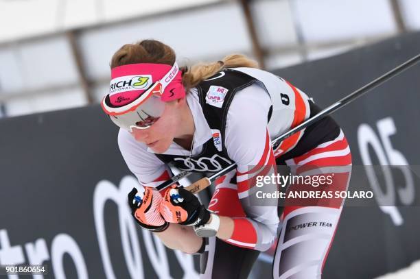Austria's Teresa Stadlober competes on January 6, 2018 during the Women's Cross Country 10 km Mass Start Classic race of the FIS World cup Tour de...