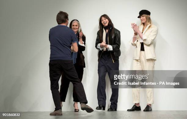 Designer Oliver Spencer, Catherine Hayward, Daisy Lowe, andJade Parfitt on the catwalk during the Oliver Spencer Autumn/ Winter 2018 London Fashion...